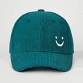 Close-up of dark green corduroy baseball cap with white embroidered smile face detail - Embroidered Smile / Dark Green
