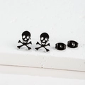 Minimalist black stainless steel skull and crossbones studs for women on stone background - 434 Black (Skull)