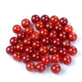 Polished round 14mm red agate gemstone beads without holes in a bulk collection - Red Agate