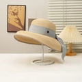 Elegant wide-brim straw sun hat with grey ribbon and gold M-logo for beach holidays - Off White