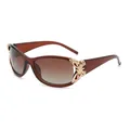 Y2K polarized cat eye sunglasses in dark brown with golden metal butterfly accents - Brown