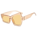 Lunettes de soleil asymétriques avec monture champagne transparent et verres jaunes - Monture Champagne / Verres Thé