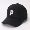 Side view of black cotton baseball cap with white embroidered P letter and curved brim - Kids (2-8 Years) / Black