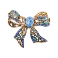 Lujoso broche de lazo dorado con cristales azules y una gran gema en forma de gota - Azul