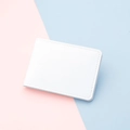 Slim white 2-slot card holder with lychee texture leather on pink and blue background - White
