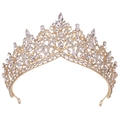 Close-up of gold bridal crown featuring intricate crystal rhinestones on a white background - KC Gold White Rhinestone