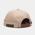 Detail view of khaki cotton docker hat showing adjustable leather strap and metal buckle - Adjustable / Khaki
