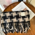 Soft black and beige checkered knit scarf with fringe trim on a rustic wooden table - Windmill Style (Black)