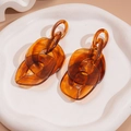 Amber acrylic chunky chain link earrings on a white tray with elegant lighting and shadows - Steel Pin - Coffee