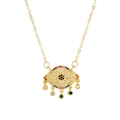Macro detail of gold evil eye pendant with multi-colored zircons and hanging gemstones - Tassel Evil Eye Zirconia