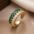 Macro detail of 18K gold plated ring featuring pear-cut green and white cubic zirconia - Pear Shaped Double Layer Style (13587) / Gold/Green