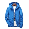 Close-up of blue hooded windbreaker jacket with full zipper and elastic cuffs - S / Royal Blue