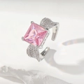 Sparkling silver ring with square pink gemstone and side pave stones in high detail - Silver