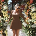 Elegant brown bodycon dress with pearl square neck and long sleeves in a garden setting - S / Khaki
