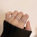 Three-piece silver minimalist ring set with sparkling zircon pave and crossover design - J952 Silver 3-Piece Ring Set