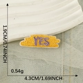 Yellow oval embroidered patch with purple YES letter text for DIY clothing decor - YES Yellow Purple
