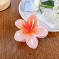 Haarklem met roze en oranje verloop en glanzende afwerking in de vorm van een bloem - Oranje 8cm