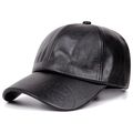 Close-up of black PU leather baseball cap featuring New York embossed logo on brim - Black