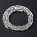 Detailed top view of silver tennis chain with sparkling rhinestones on black background - 40 cm / Silver White 3mm
