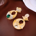 Detailed view of vintage gold plated heart earrings with emerald gems and rhinestones - Gold Emerald Gemstone Vintage Ear Clips (11#)