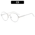 Women's round gold metal sunglasses featuring decorative rhinestone embellished temples - Silver Frame Clear Lenses