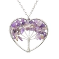 Detailed view of handmade heart-shaped tree of life pendant with purple amethyst crystals - Purple Crystal