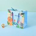 Blue gift bag with cartoon forest animals lion and elephant with braided handle - Blue Animals Style