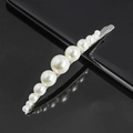Elegant hair clip with gradient faux pearls on silver metal base over black surface - Silver Gradient Pearl Curved Pin