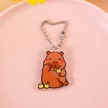 Simpatico portachiavi in acrilico capibara con motivo a frutti gialli e catenina in argento - Capibara con frutta