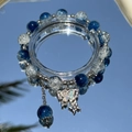 Exquisite blue and silver beaded bracelet with silver butterfly pendant on reflective surface - S012 Jade Shattered Butterfly Bracelet [dark Blue] #sz270