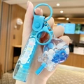 Blue bubble tea cup keychain with floating bear and liquid glitter sand strap - Fresh Lollipop - Blue