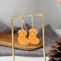 Festive Christmas stocking resin earrings with colorful polka dots on gold hooks - Christmas Sock