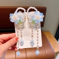 Handheld Hanfu hair clip with blue glass flower and long pearl tassels in gold - Graceful Blue Glaze