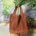 Brown knit mesh hollow tote bag with a minimalist woven design for women's summer fashion - Caramel color