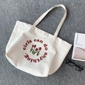 Close-up of thick canvas tote bag with tulip print and girls can do anything text - Tulip Print (Large Capacity)