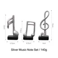 Set of 3 silver music note figurines on black bases for minimalist desk decor - Silver
