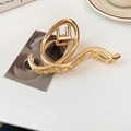 Elegant gold-tone irregular metal hair claw clip with streamline hollow design for women - Letter Q Geometric Style (HH4450)
