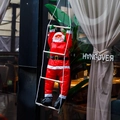 Detail of Christmas Santa climbing a four-step rope ladder for festive window decoration - 90CM Climbing Ladder Santa