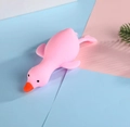 Pink squeeze toy duckling with orange beak for stress relief on a pastel background - Standard Type / Pink