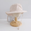 Close-up of kids sun hat featuring a pink brim and checkered neck protection flap - 50cm (1-3 Years) / Beige - Plaid Flap