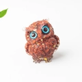 Brown resin owl figurine with gold glitter, blue eyes, and natural crystal stone detail - Red Jasper