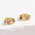Detail of gold hoop earrings with blue, pink, white, and black enamel star charms - Star Multi-Color