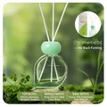 Translucent green droplet glass diffuser bottle with natural forest background and fiber sticks - Landscape Painting 80ml