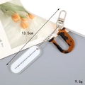 Chic tortoiseshell letter U keychain with white engraved tag for bag and headphone case - Letter U