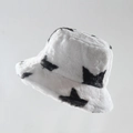 Plush white bucket hat featuring black star patterns for a cozy winter fashion look - Pentagram White
