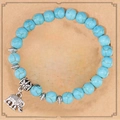 Blue turquoise beaded bracelet with vintage silver elephant charm on a kraft gift card - Blue Turquoise Elephant With Card