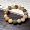 Multi-color Bodhi root beaded bracelet with round earth tone stones on book - Multicolor Round Bead Single Loop Style