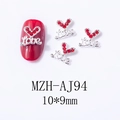 Detailed view of red heart Love nail charms with rhinestones on silver alloy base - Love Letter Heart Style (AJ94)