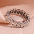 Silver stainless steel eternity ring featuring oval cut cubic zirconia on pink fabric - US 6 / Silver with White Zirconia