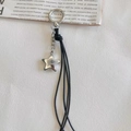 Pendentif étoile argenté rétro Y2K avec cordons noirs et fermoir mousqueton - Noir